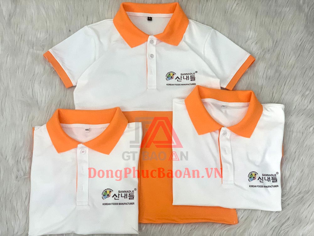 May áo đồng phục giá rẻ TPHCM quận Bình Tân - Mẫu áo thun cổ trụ màu trắng phối cam SANNADLE